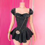 A doll in denin dress